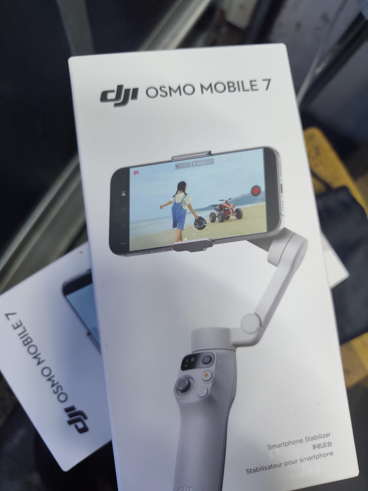 DJI Osmo Mobile 7 Gimbal Stabilizer for iPhone, Android, Built-in Tripod, Portable Stabilizer for iPhone, Selfie Stick, 3-Axis Phone Gimbal, ActiveTrack 7.0, One-Tap Edit, 10hrs Use, Phone Charging customer photo 1
