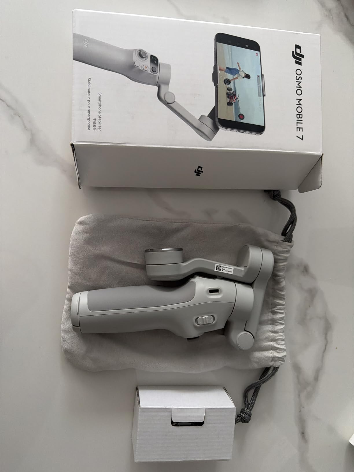 DJI Osmo Mobile 7 Gimbal Stabilizer for iPhone, Android, Built-in Tripod, Portable Stabilizer for iPhone, Selfie Stick, 3-Axis Phone Gimbal, ActiveTrack 7.0, One-Tap Edit, 10hrs Use, Phone Charging customer photo 2