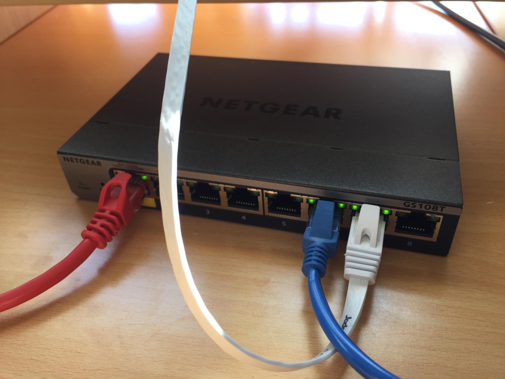 NETGEAR 24-Port Gigabit Ethernet Smart Switch (GS724T) - Managed, Optional 1 Year Insight Cloud Management, 2 x 1G SFP, Desktop or Rackmount customer photo 1