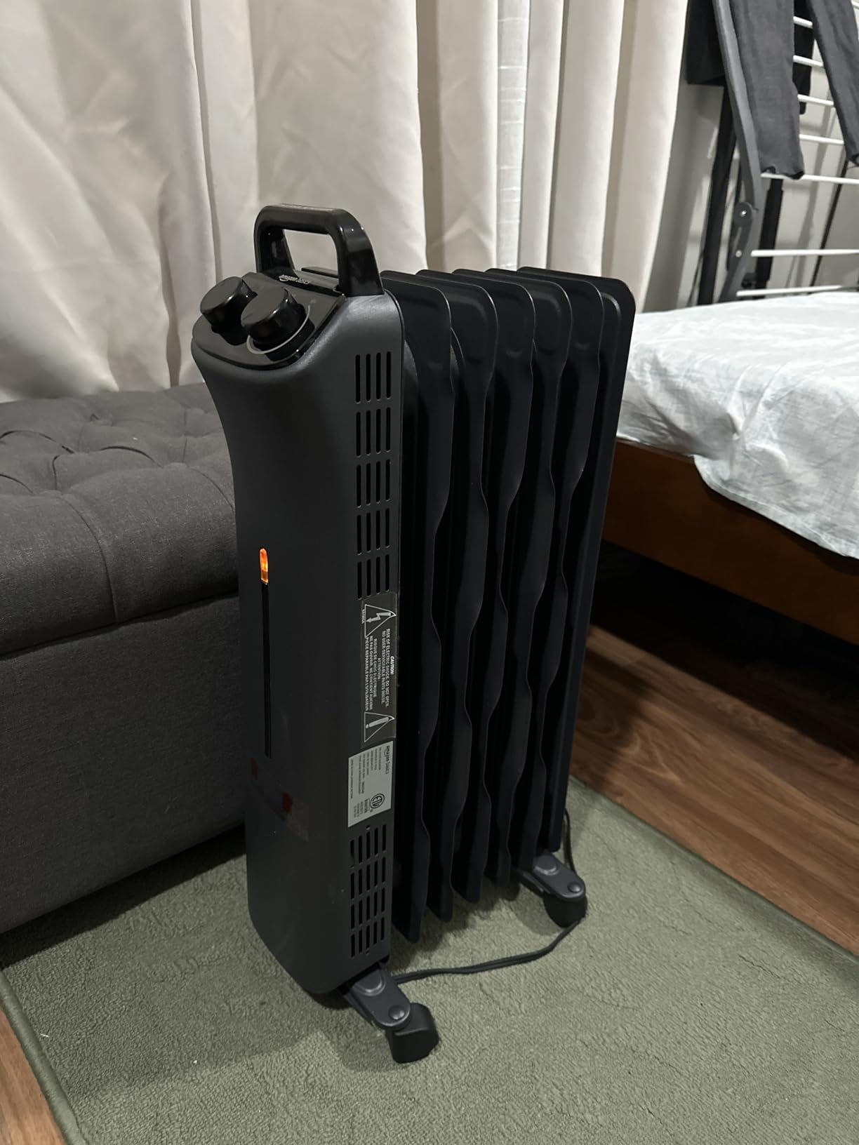 Amazon Basics Portable Oil Space Heater with 7 Oil-Filled Fins, 3 Heat Settings, Adjustable Thermostat, Tip-Over and Overheat Protection, ETL Safety Certificate, 1500W, Black customer photo 1