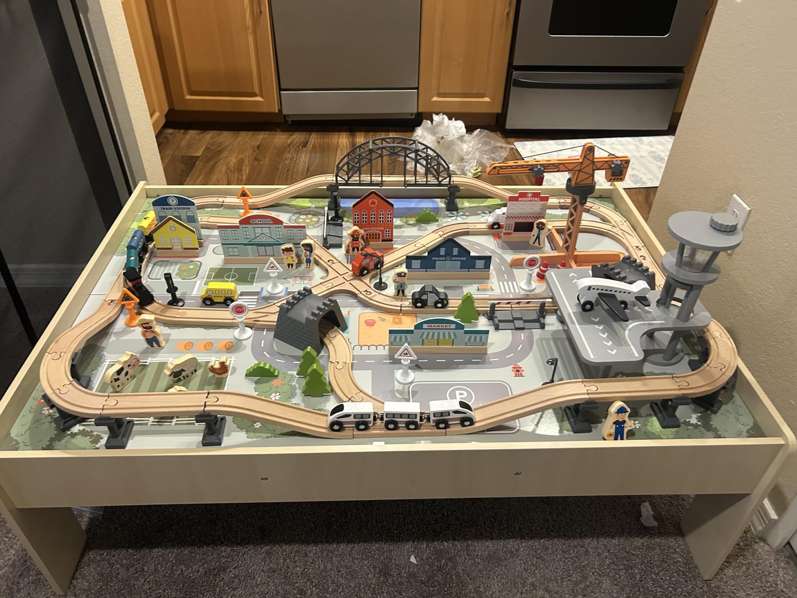 Amazon Basics 120 Piece Wooden Train Set with Activity Table customer photo 1