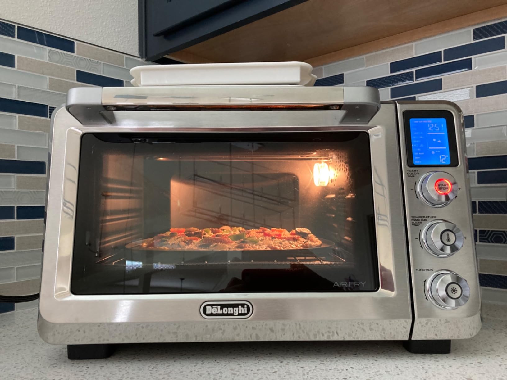 De'Longhi 10-in-1 Digital AirFryer, 24L, True Convection Toaster Oven with Internal Light, Grills, Broils, Bakes, Roasts, Reheats, Preset for Cookie & Pizza, 1800-Watts, Stainless Steel customer photo 1