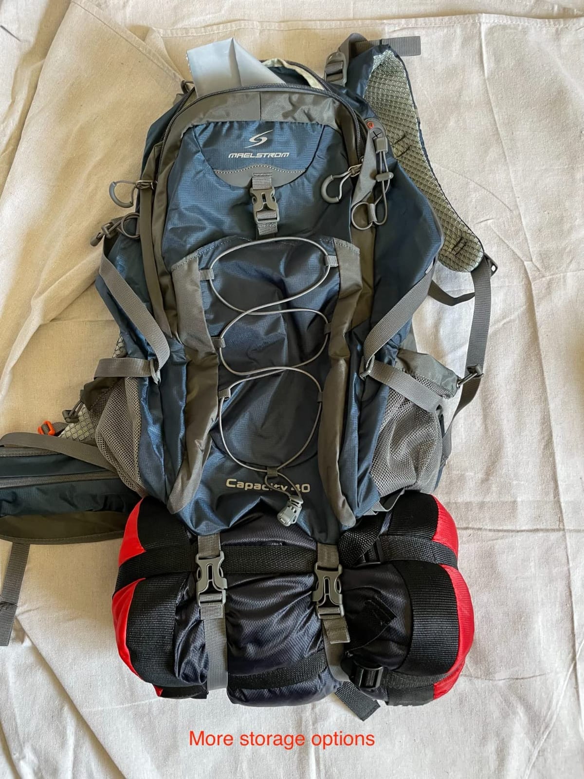 Maelstrom 40L Hiking Backpack, Lightweight Camping Daypack with Rain Cover | Water-Resistant Rip-Stop Nylon, Wet/Dry Separation, Multi-Pockets, Survival Whistle. Ideal For Men, Women, Travel, Trekking customer photo 1
