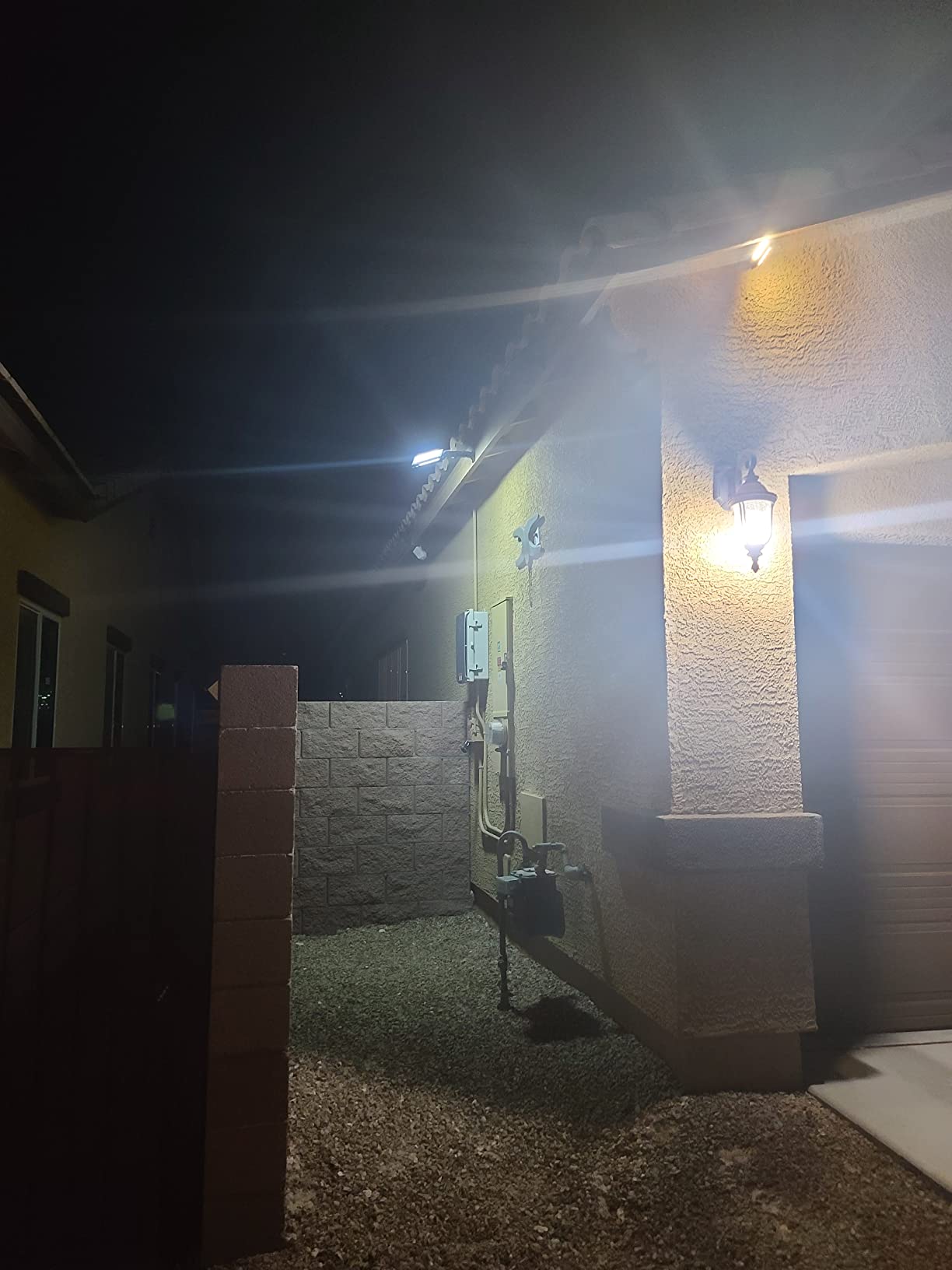 ropelux Solar Flood Lights Outdoor, 6000LM High Brightness Motion Sensor | IP65 Waterproof, 5 Modes Outdoor Lights, 6500K Wider Illuminated Area LED Solar Lights, Garage Patio Street Front Door Black customer photo 1