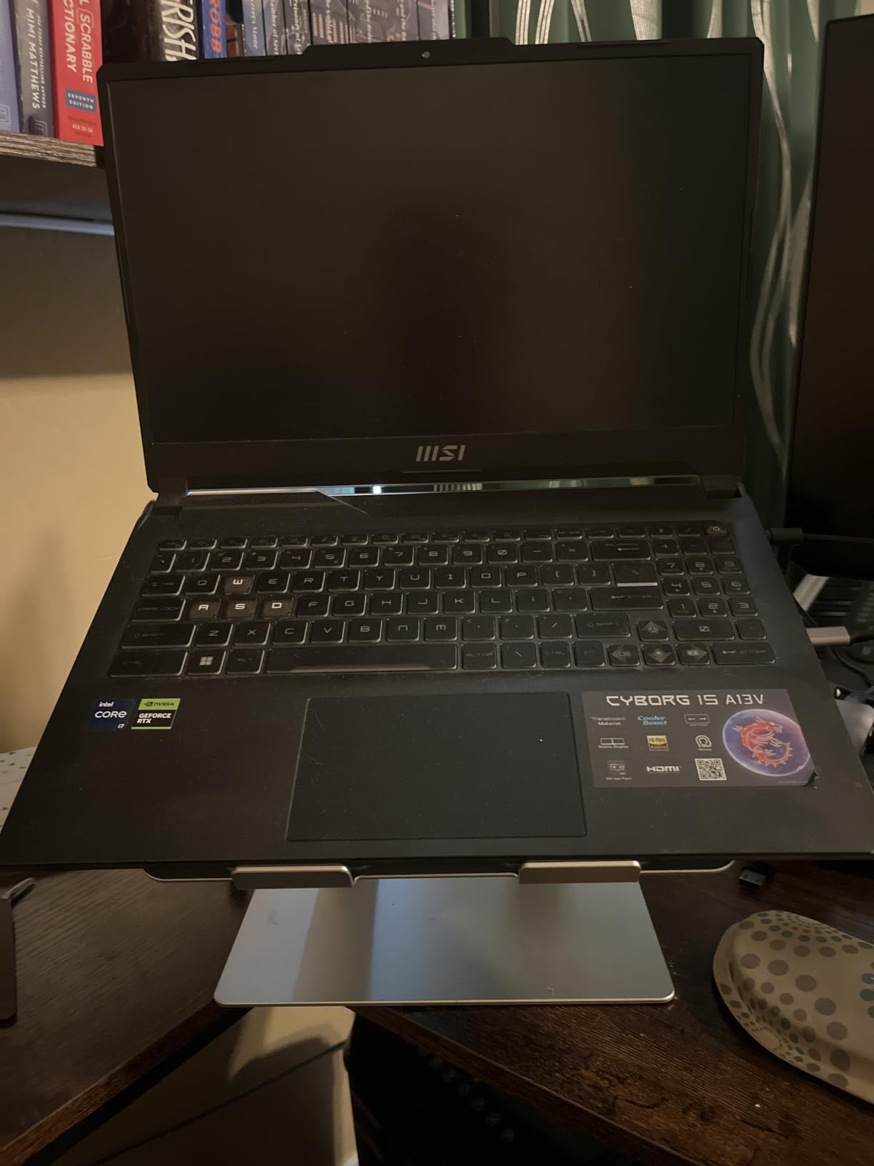 Amazon Basics Sturdy and Portable Ergonomic Laptop Stand for Desk, Height Adjustable Riser with Ventilated Cooling, Foldable, Fits all Laptops up to 15.6 Inch, Silver customer photo 2