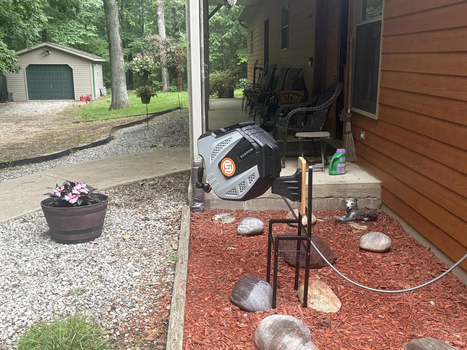 SUNPOW Retractable Garden Hose Reel - 1/2 inch x 50ft Heavy Duty Wall Mounted Hose Reel with 3/4 inch Brass Fitting & 10 Sprayer Nozzle - Any Length Lock, Auto Rewind System, 180°Swivel Bracket- Grey customer photo 1