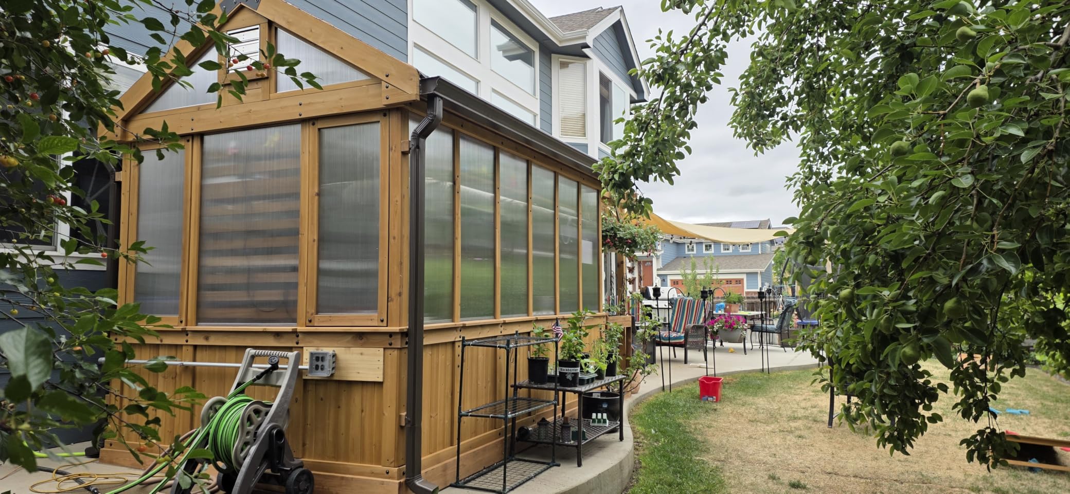 Backyard Discovery Bellerose XL 13' x 11' Cedar Wood and Polycarbonate Walk-in Greenhouse Kit with Pergola, Exhaust Fan, Windows, Hose Hook-Ups, PowerPort, Staging Shelves for Outdoor Gardening customer photo 1
