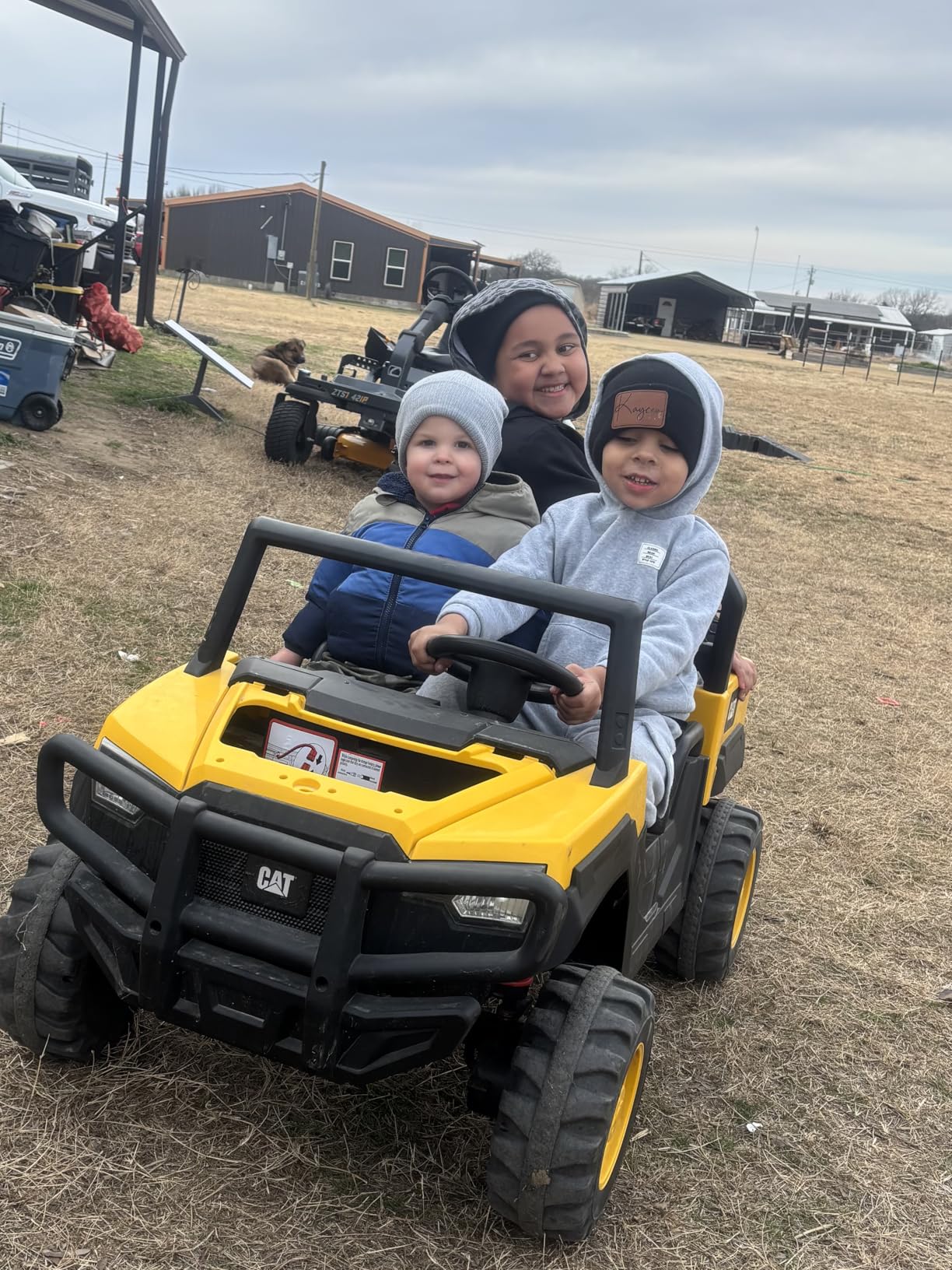 ANPABO 2 Seater Licensed Caterpillar Ride On Dump Truck, 24V Ride On Toys with 4×100W Motors, Up to 5Mph, Parent Remote, Shock Absorbers, Dump Bed and Shovel, Electric Car for Kids customer photo 1