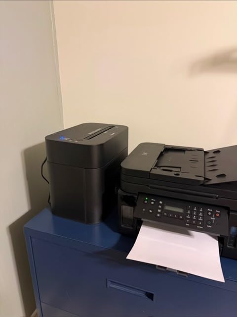Staples 12-Sheet Micro-Cut Paper Shredder, Compact, High-Security, Black | Shreds credit cards and documents for home or office. Space-saving design. customer photo 1