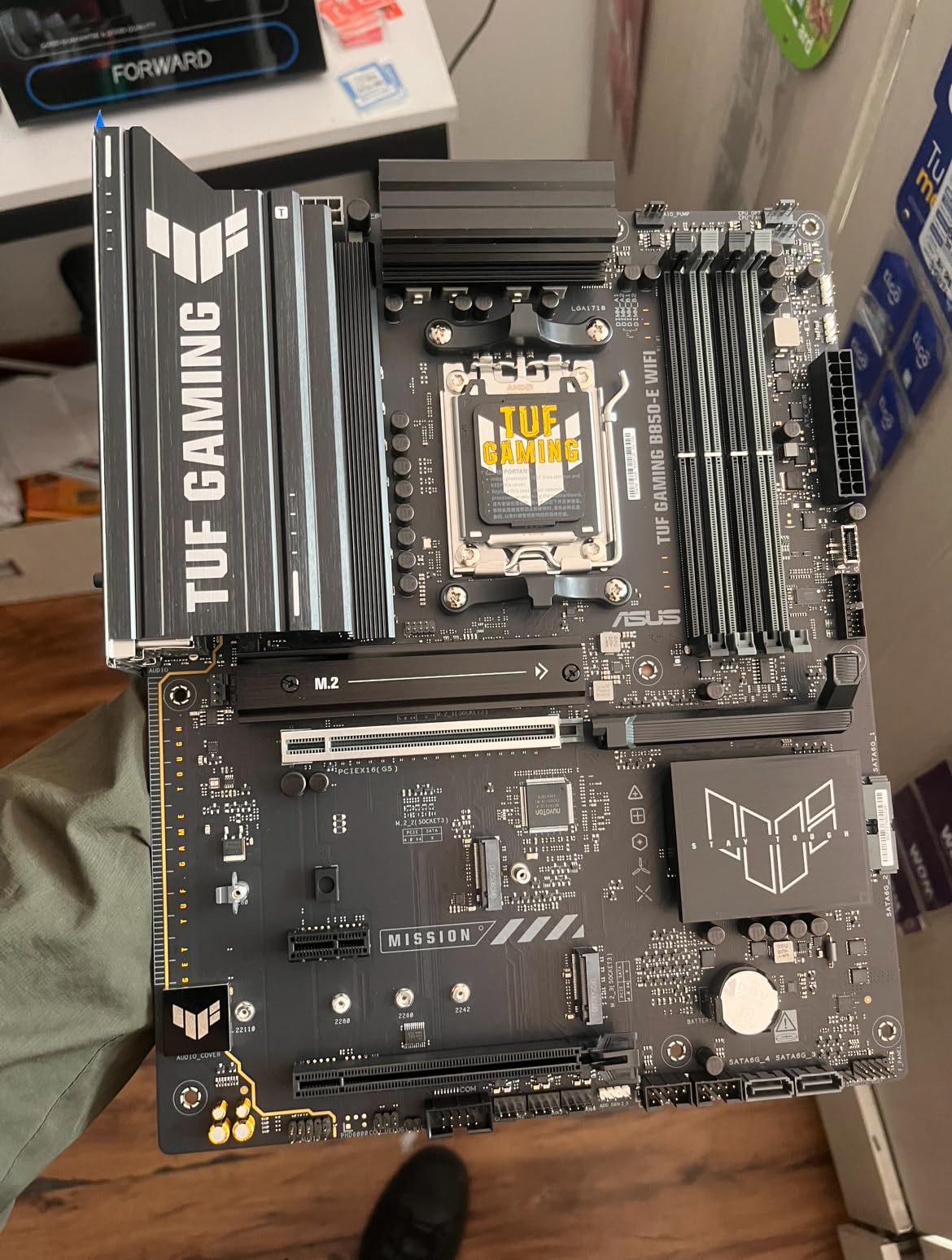 ASUS TUF GAMING B850-E WIFI AMD AM5 B850 ATX Motherboard, DDR5, PCIe 5.0 Ready, M.2 slots x3, Wi-Fi 6E, 2.5Gb Ethernet, DisplayPort, HDMI, USB 20Gbps Type-C, USB 10Gbps Type-C, BIOS FlashBack, AuraSync customer photo 1
