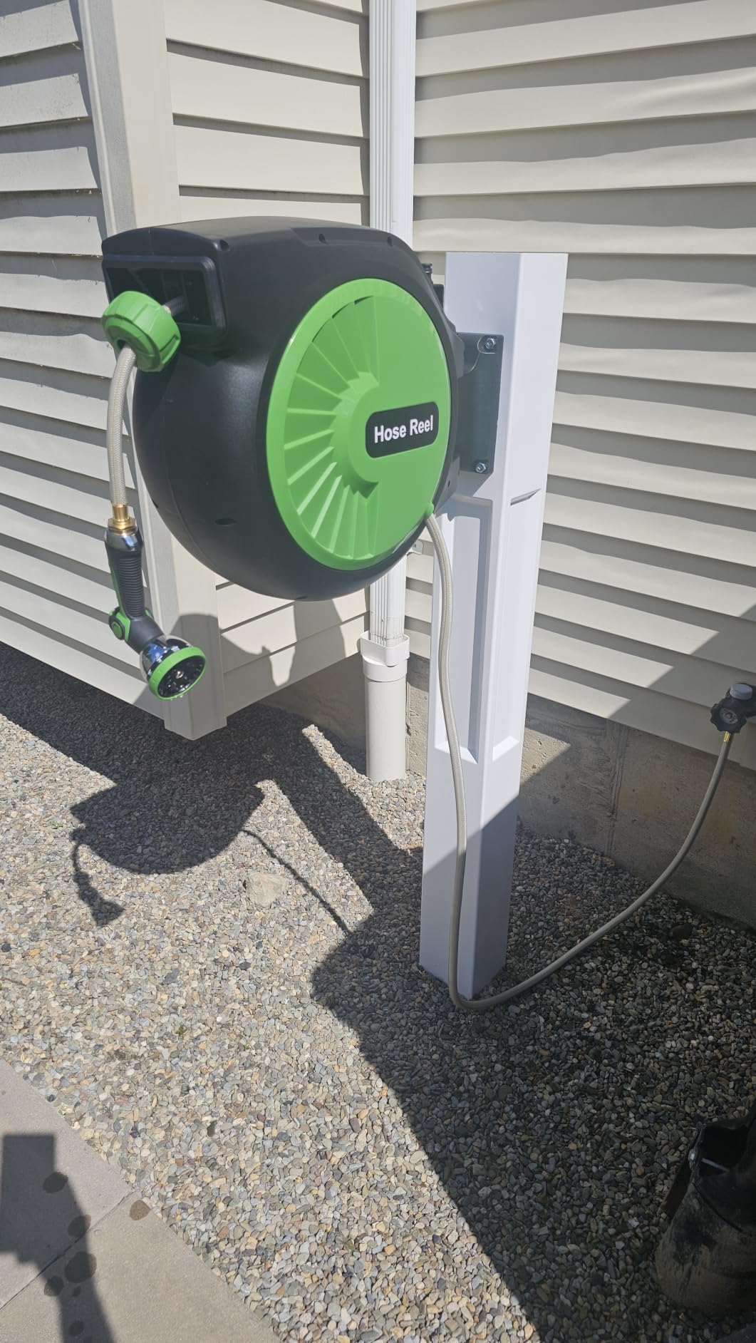 Retractable Garden Hose Reel 100FT x 1/2 in, Wall Mount Water Hose Reel for Outside with Auto Rewind, Tangle-Free Guide, 180° Swivel Bracket, Lock at Any Length, High-Pressure Flow, 10-Pattern Nozzle customer photo 2