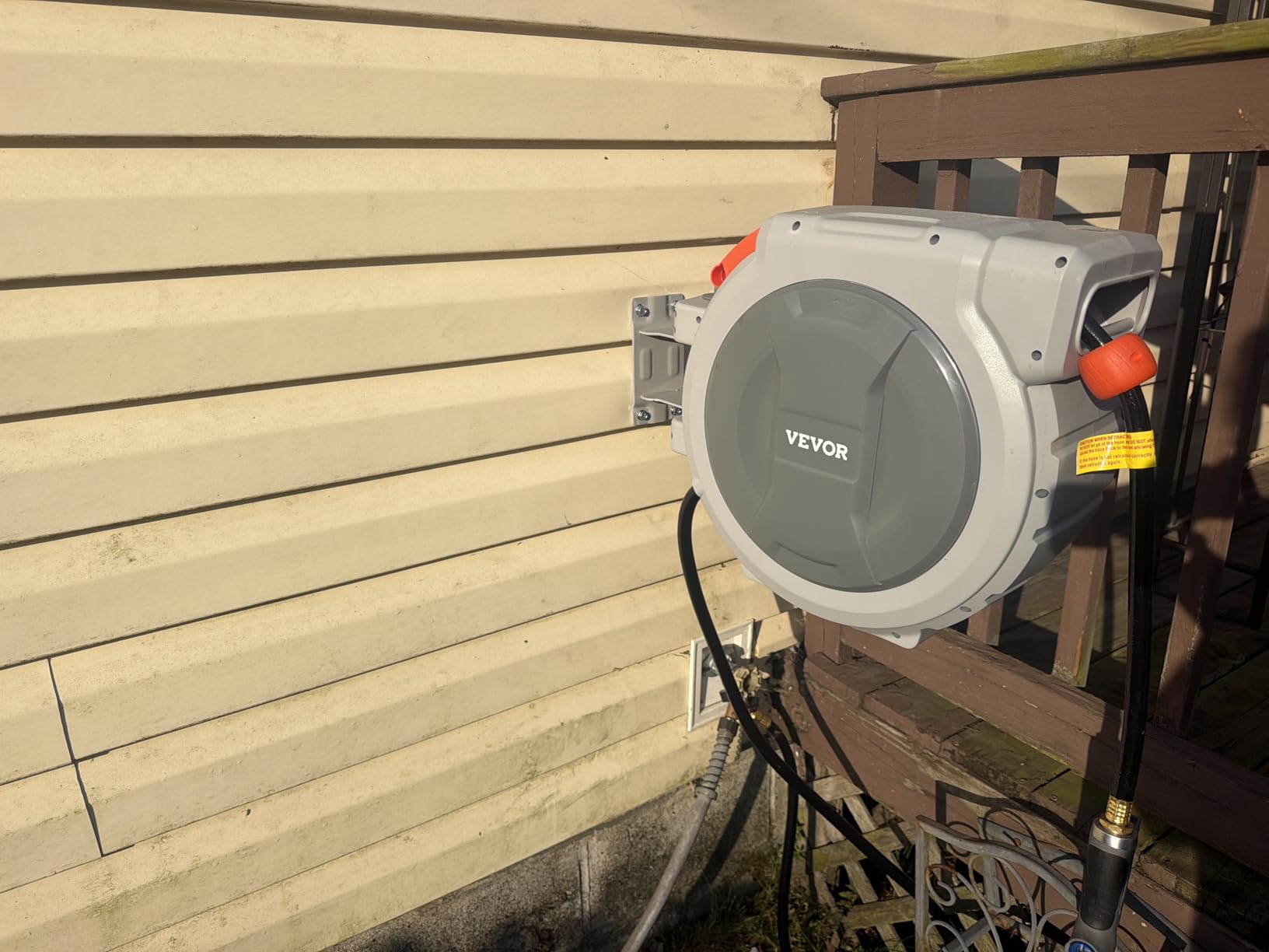 VEVOR Retractable Garden Hose Reel, 1/2 in x 50 ft, Wall Mounted Hose Reel with 9-Function Sprayer Nozzle and 180° Swivel Bracket, Any Length Lock, Automatic Slow Rewind System, for Garden Watering customer photo 1