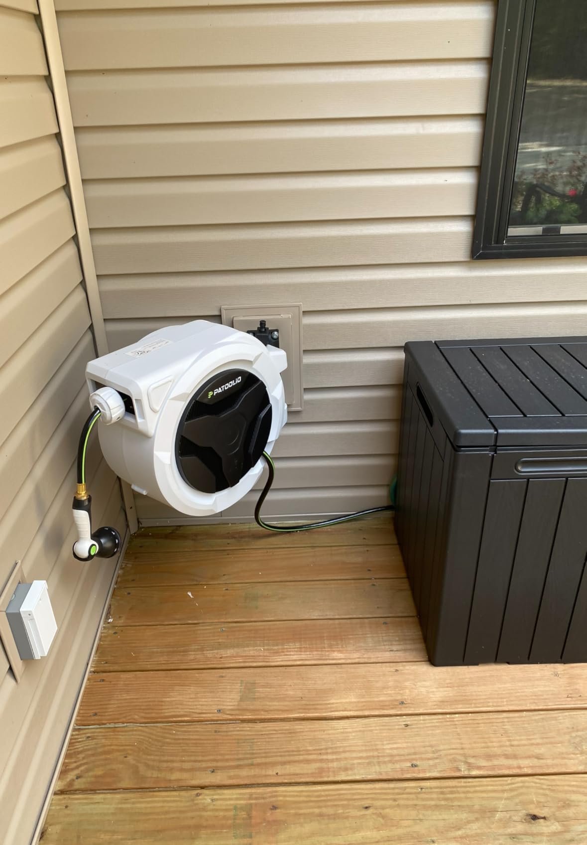 Retractable Garden Hose Reel, Wall Mounted 100 FT 5/8inch Water Hose Reel | Any-length Lock, 11s Upgraded Auto Rewind, 9 Spray Modes, 180° Swivel for Watering, Car Washing and Outdoor Use customer photo 1
