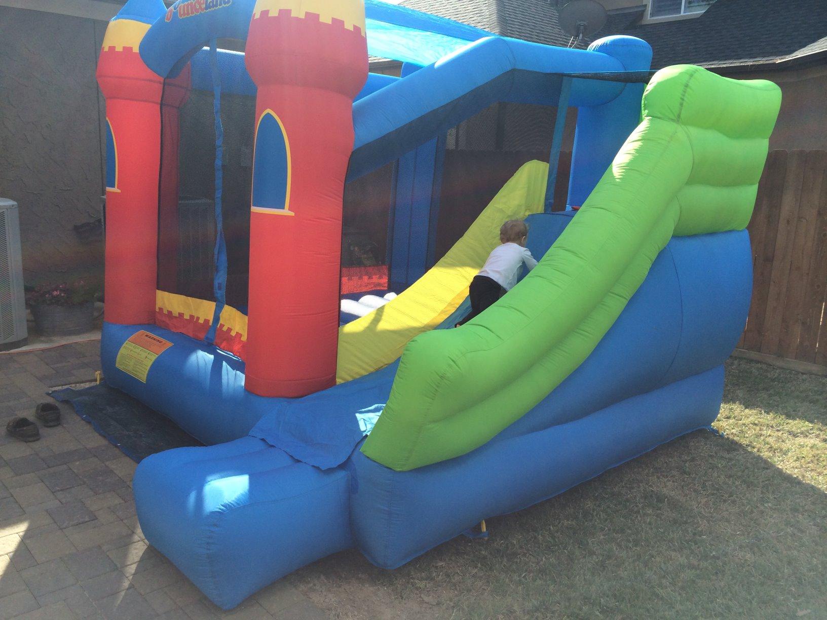 Bounceland Royal Palace Inflatable Bounce House, with Long Slide, Large Bouncing Area, Basketball Hoop and Sun Roof, 13 ft x 12 ft x 9 ft H, UL Strong Certified Blower, Castle Kids Party Theme customer photo 1