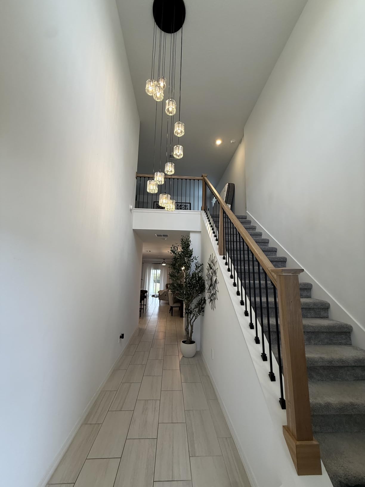 Long Chandeliers for High Ceilings,Modern Crystal Pendant Light,Raindrop Drop Lamp,Hanging Flush Mount Lighting Fixtures for Spiral Staircase,Foyer,Entryway,Living Room,Black (8 Lights) customer photo 2